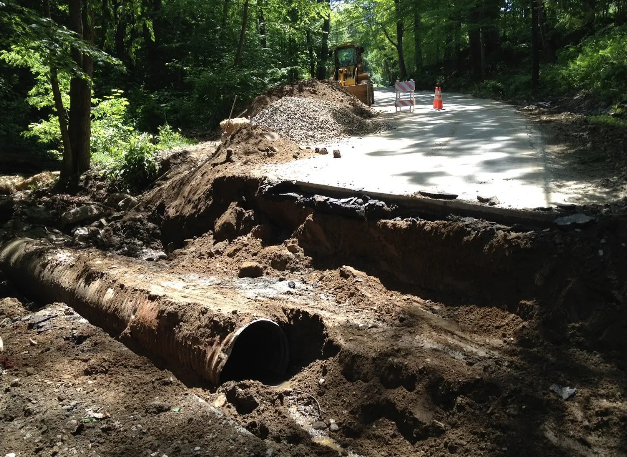 Constructing a longer access road with proper base and drainage