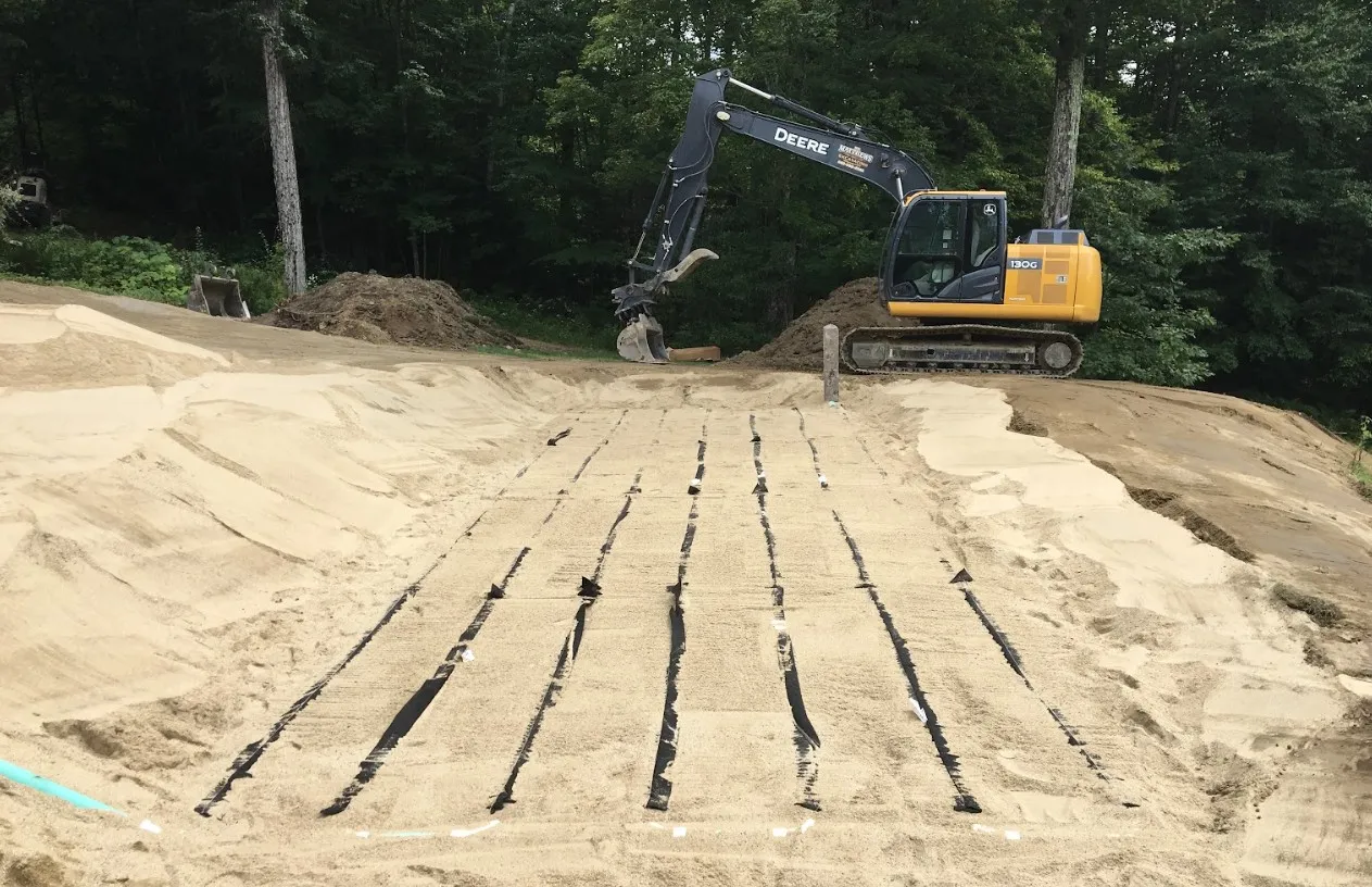 Site excavation beginning for a new septic system installation