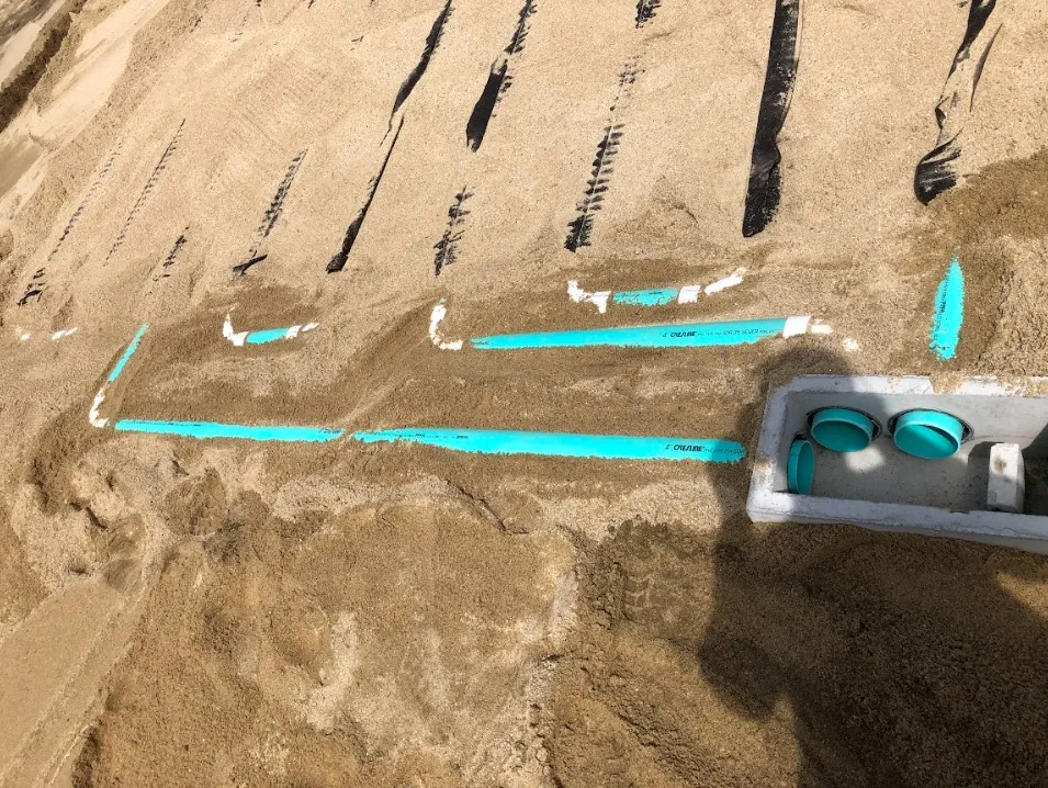 Excavation for a septic tank and leach field