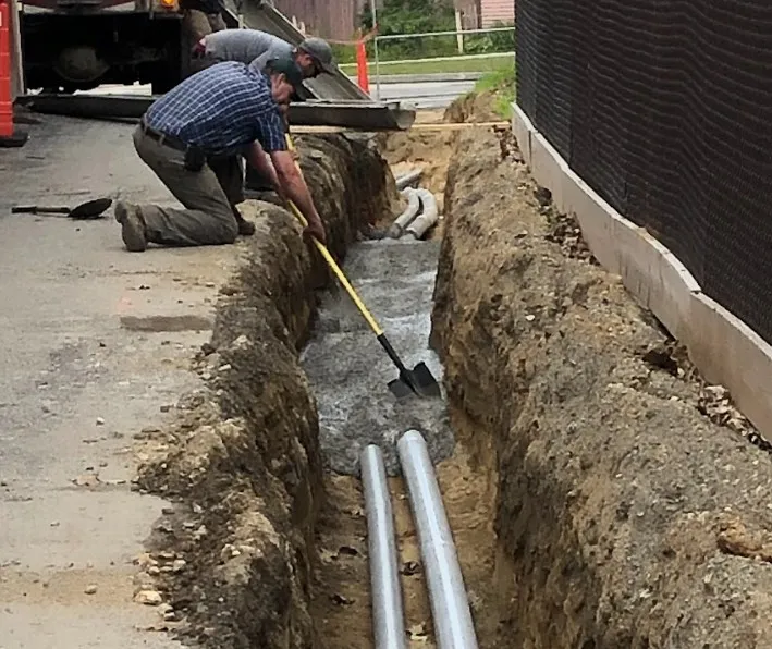 Utility trench dug for underground line installation